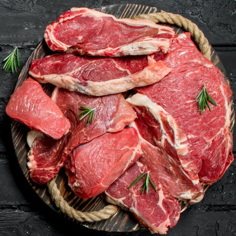 A Display of meat on a neutral background