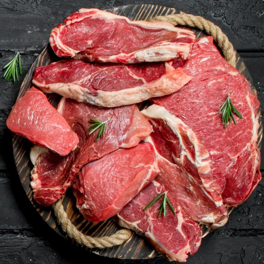 A Display of meat on a neutral background